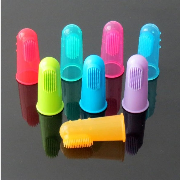 Set of colorful plastic cups with different shapes on a reflective surface