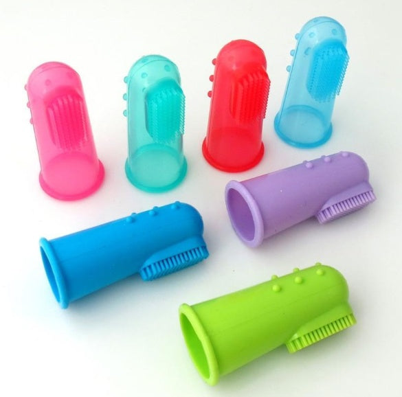Colorful silicone finger exercisers on a white background