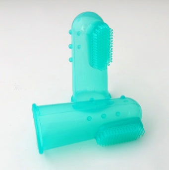 Turquoise silicone toy with textured design on a white background