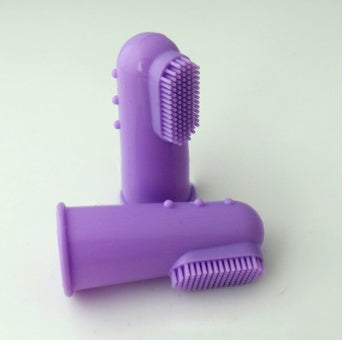 Purple handheld scrubber on a white background