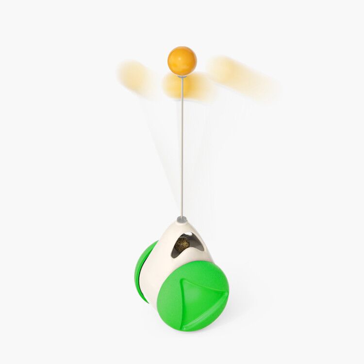 Toy with a green base and white top on a white background