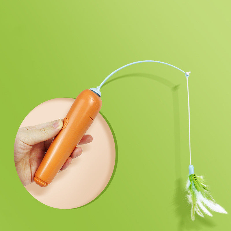 Orange electronic pet toy with a string and feather on a green background
