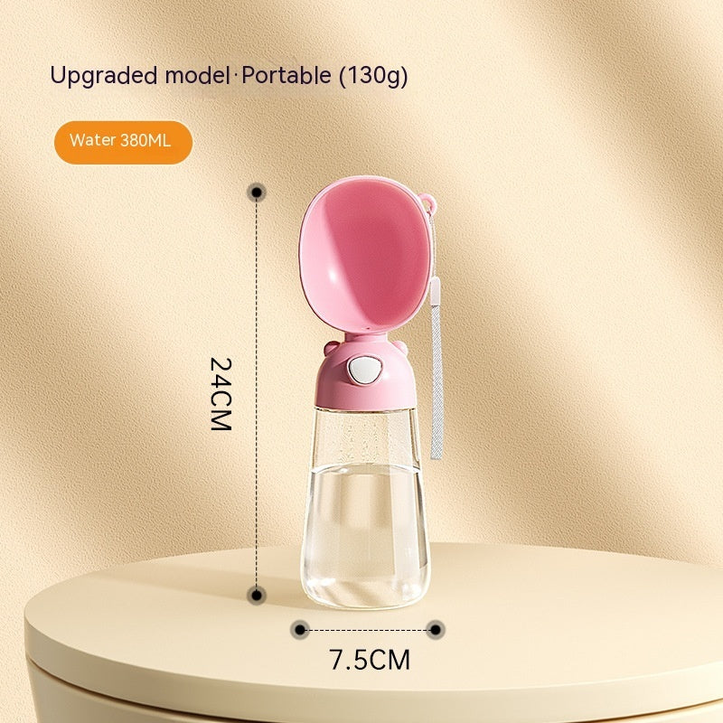 Pink portable water bottle with measurements on a beige background