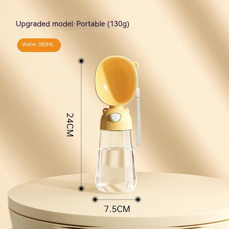 Yellow portable water bottle with measurements on a beige background