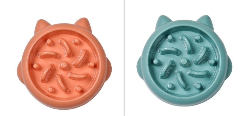 Two pet toys, one orange and one blue, with textured surfaces on a white background.